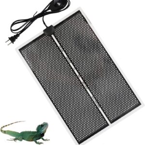 Reptile heating pad providing essential warmth for a pet lizard in a terrarium.